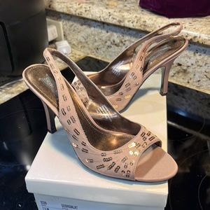Style & Co latte colored sling back peel toe heels.